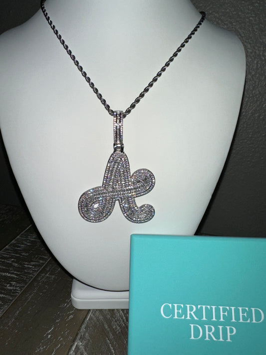 Image of silver Icy baguette cursive initial pendant. 