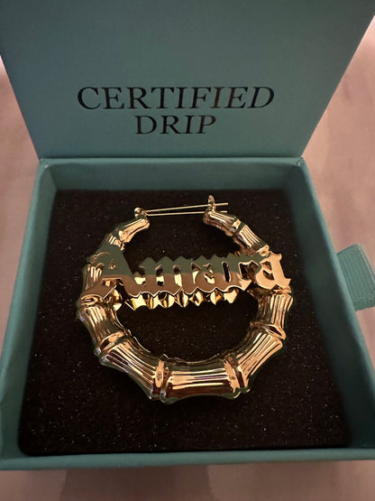 Picture of 60mm gold bamboo earrings. 